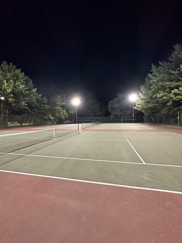 Tennis courts by playground tennis courts